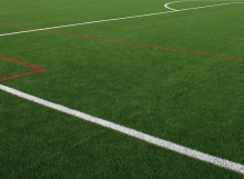 Campo de fútbol artificial verde